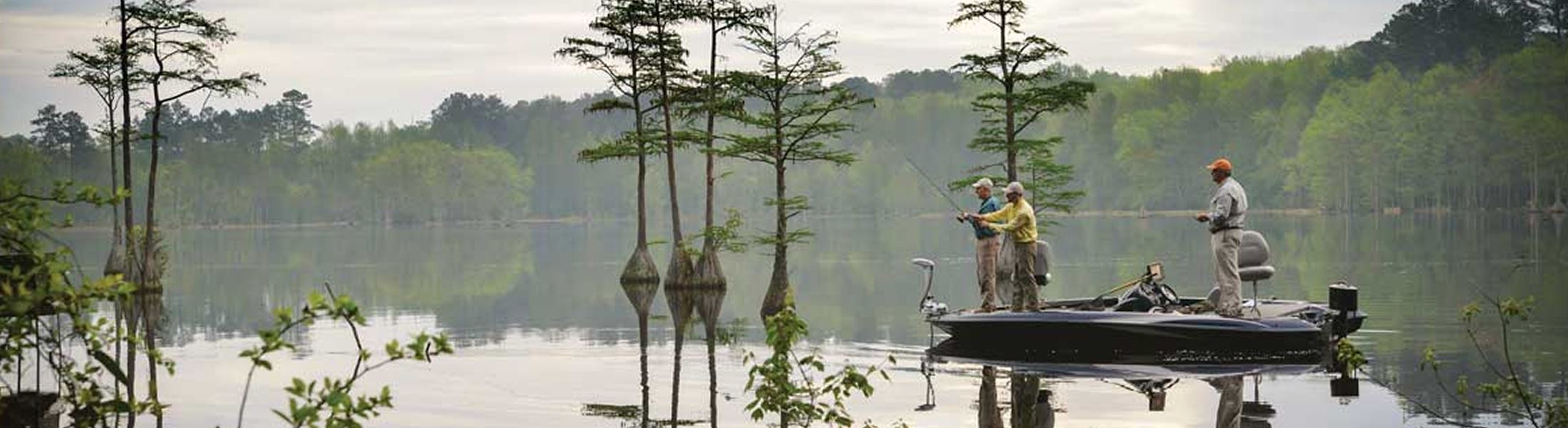 View of people fishing on a boat